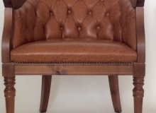 Poltrona in pelle capitonné